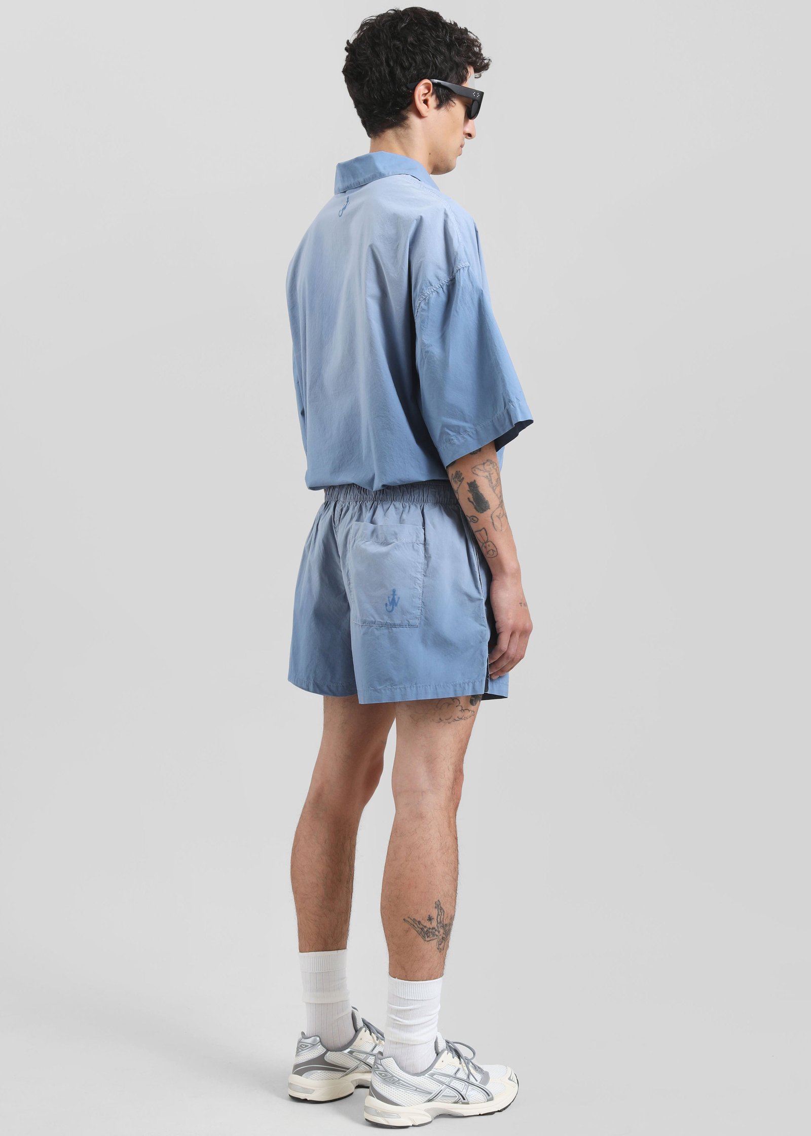 JW-ANDERSON-LOGO-PRINT-SHORTS-LIGHT-BLUE-GABRIEL-01244